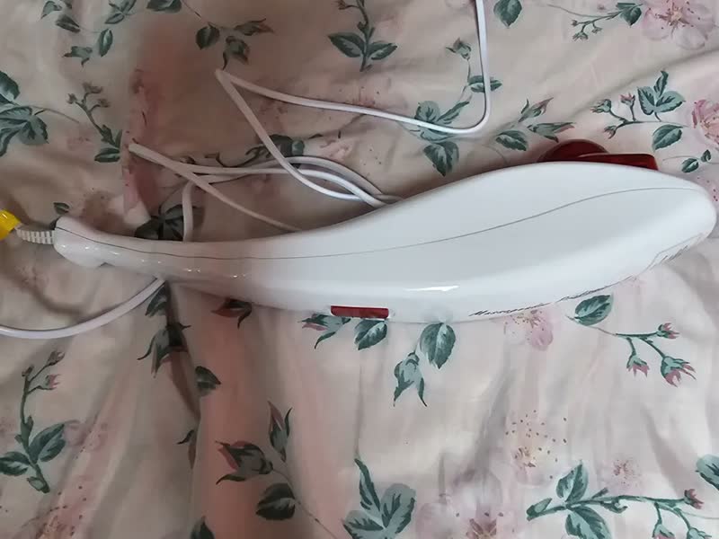 foto de Massageador Manual Infravermelho Vibratório Percussão