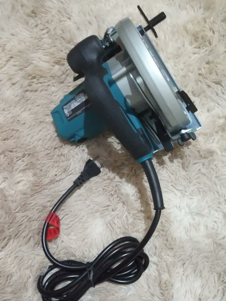 foto de Serra Circular Para Madeira 7.1/4pol 1600w - Hs7010 Makita Cor Azul-turquesa
