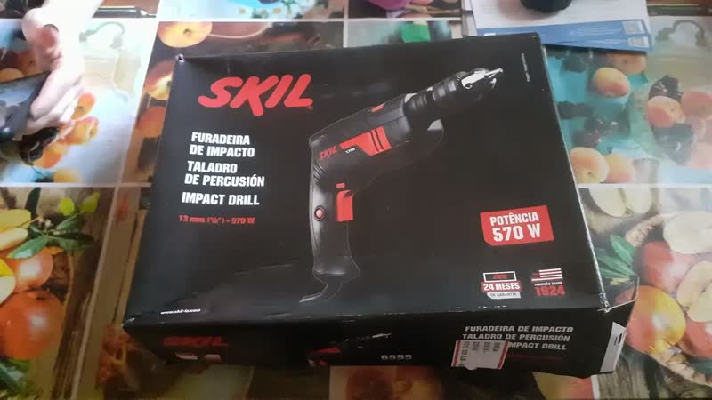 foto de Furadeira De Impacto Parafusadeira Elétrica De 13mm Skil 6555 570W Com Caixa De Papelão