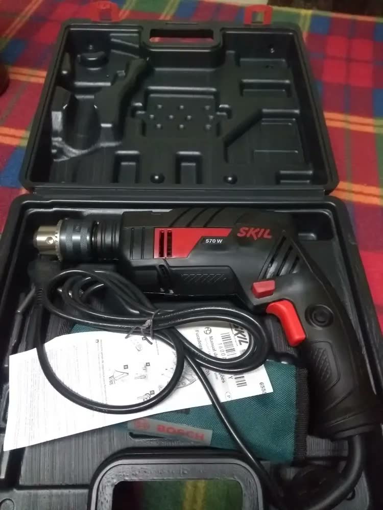 foto de Furadeira De Impacto Parafusadeira Elétrica De 13mm Skil 6555 570W Com Caixa De Papelão