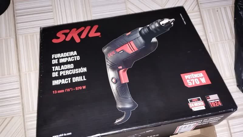 foto de Furadeira De Impacto Parafusadeira Elétrica De 13mm Skil 6555 570W Com Caixa De Papelão