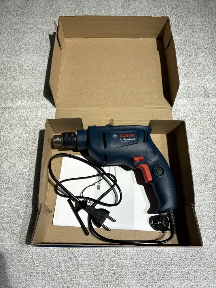 foto de Furadeira rotativa de impacto Bosch 450W Gsb 450re, cor azul
