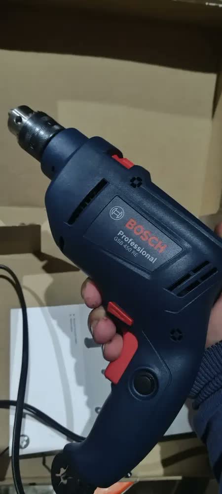 foto de Furadeira rotativa de impacto Bosch 450W Gsb 450re, cor azul