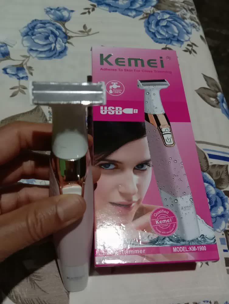 foto de Depilador Elétrico Recarregável Kemei KM-1900 para Zonas Íntimas Bivolt Rosa