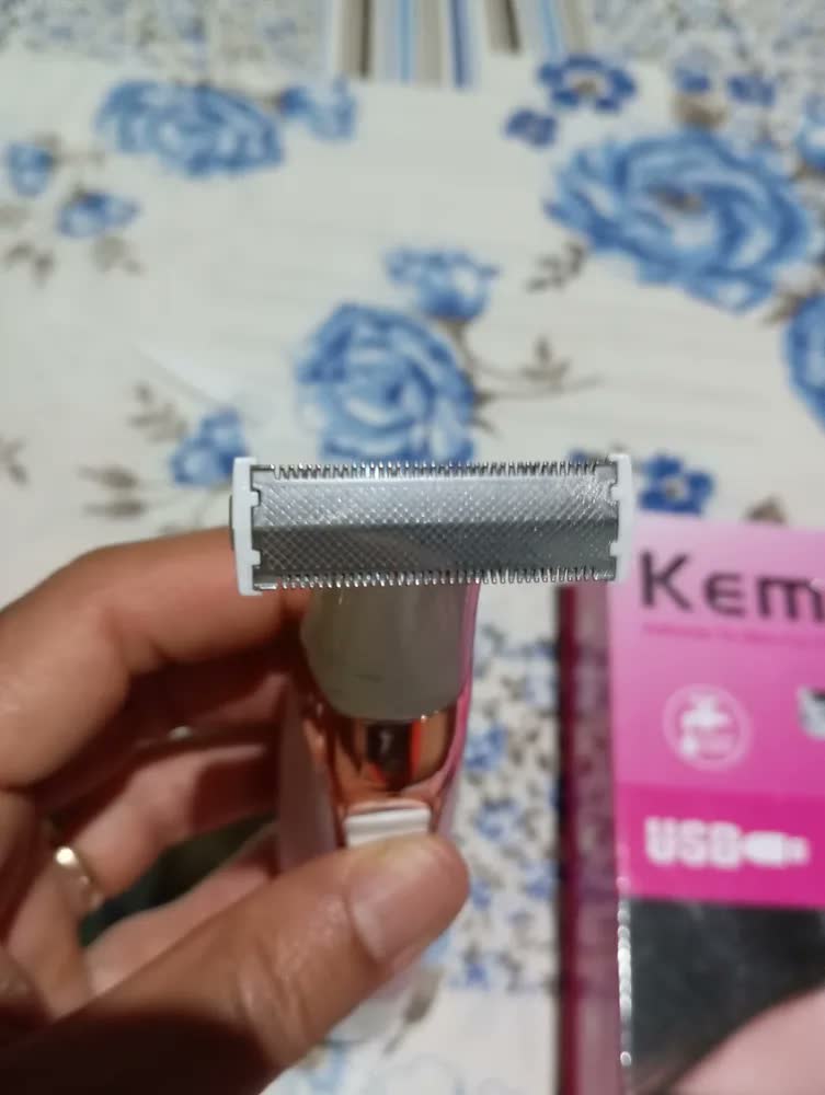 foto de Depilador Elétrico Recarregável Kemei KM-1900 para Zonas Íntimas Bivolt Rosa