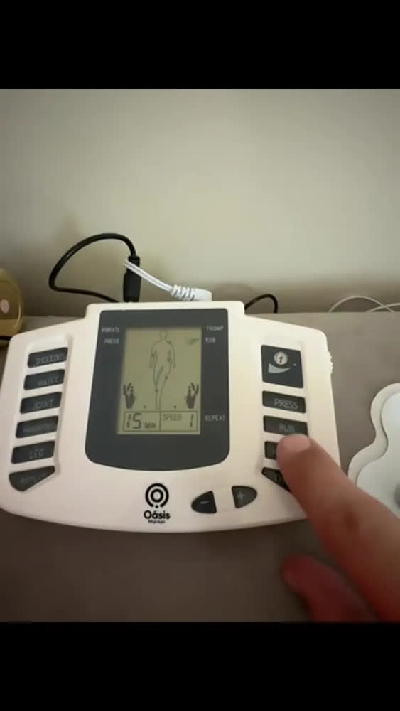 foto de Aparelho Fisioterapia Massagem Prático Tratamento Choque Cor Branco