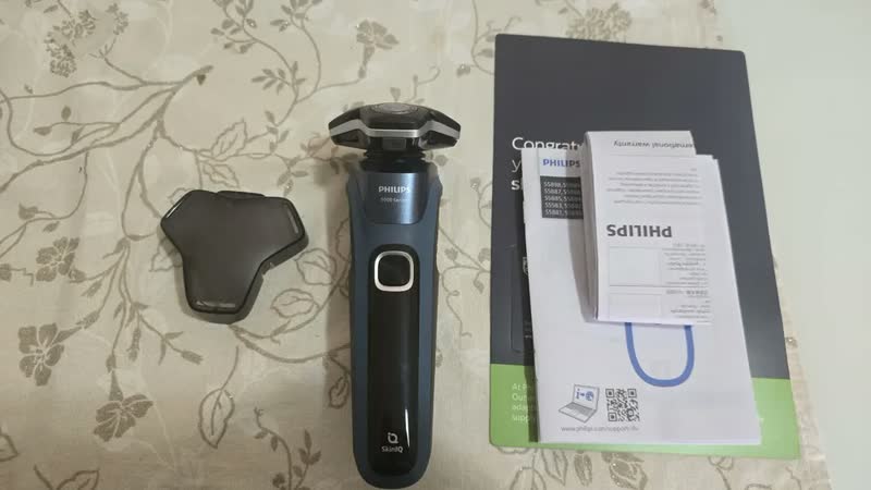 foto de Barbeador Elétrico Power Adapt auto afiável, à prova d’água, Bivolt – S5880/20, Philips