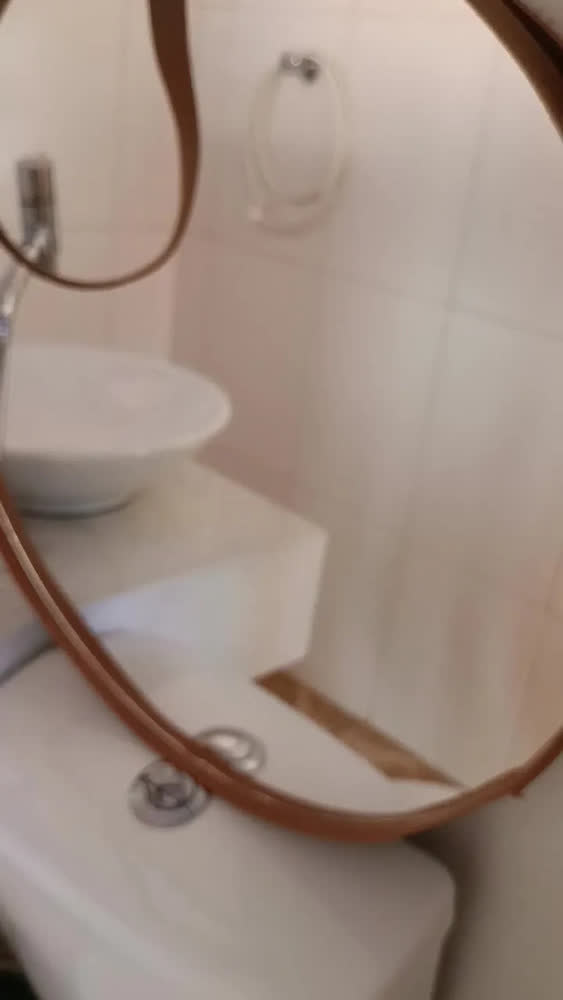 foto de Espelho Redondo Adnet Premium Preto de 60 cm Com Alça em Couro
