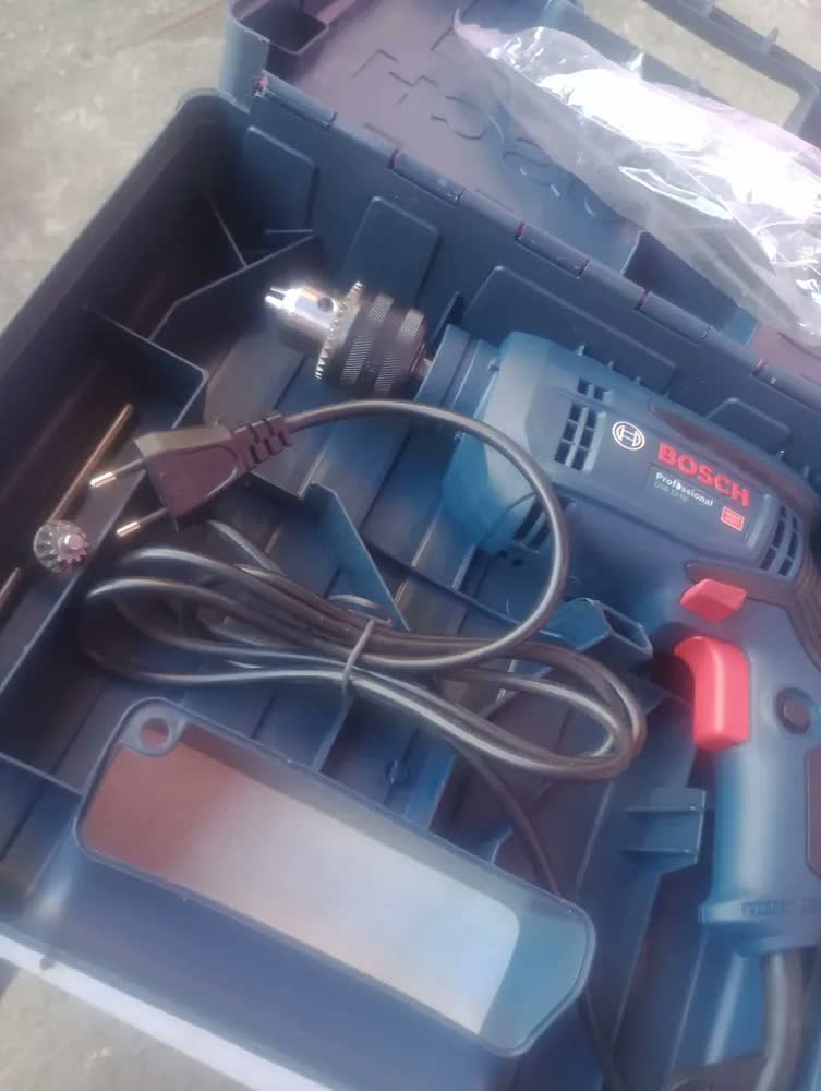 foto de Furadeira De Impacto 750w Gsb 13 Re Em Maleta Bosch Cor Azul