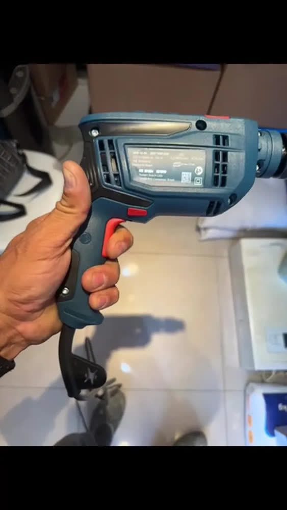 foto de Furadeira De Impacto 750w Gsb 13 Re Em Maleta Bosch Cor Azul