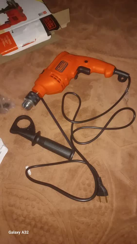 foto de Furadeira Impacto 1/2 Martelete Reversível 560w B&d Cor Laranja