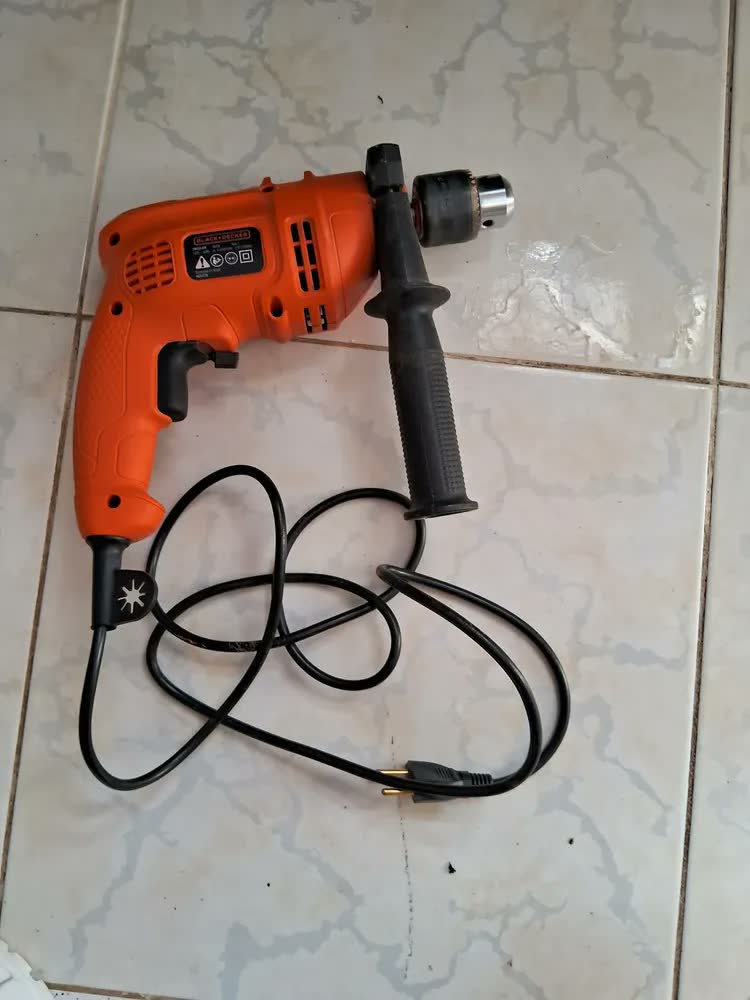 foto de Furadeira Impacto 1/2 Martelete Reversível 560w B&d Cor Laranja
