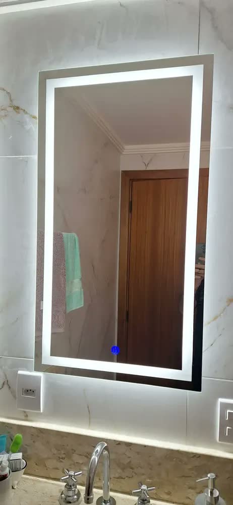 foto de Espelho retangular 90x50 jateado com led 3 cores e touch moldura led frio