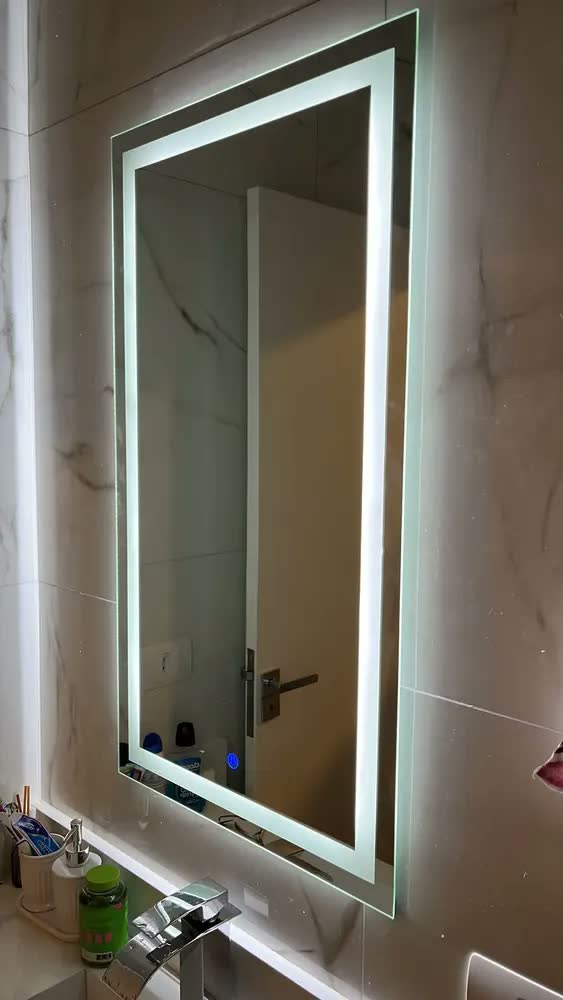 foto de Espelho retangular 90x50 jateado com led 3 cores e touch moldura led frio