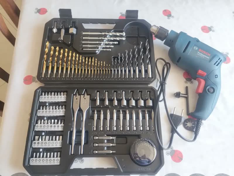 foto de Furadeira De Impacto 3/8 10mm Gsb450 Re Bosch Com Jogo De Brocas Bits 103 Profissional Peças Bosch