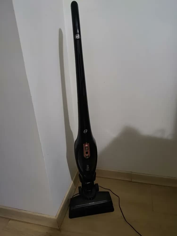 foto de Aspirador De Pó Oster Vertical Sem Fio Duo Clean 2 Em 1 Bat Cor Preto/cobre