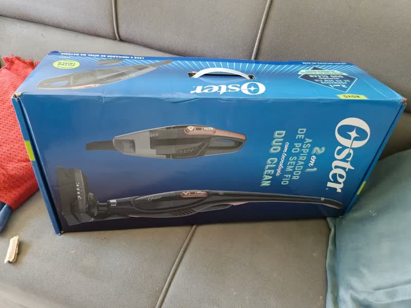 foto de Aspirador De Pó Oster Vertical Sem Fio Duo Clean 2 Em 1 Bat Cor Preto/cobre