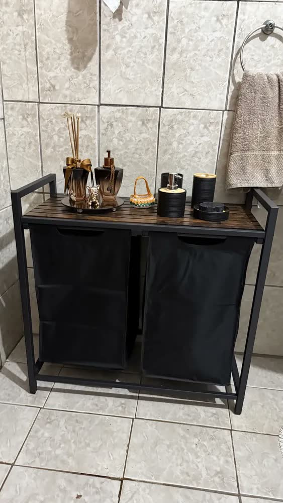 foto de Cesto de roupa suja Vasagle com tampa, 2 bolsas e 2 prateleiras, preto sólido