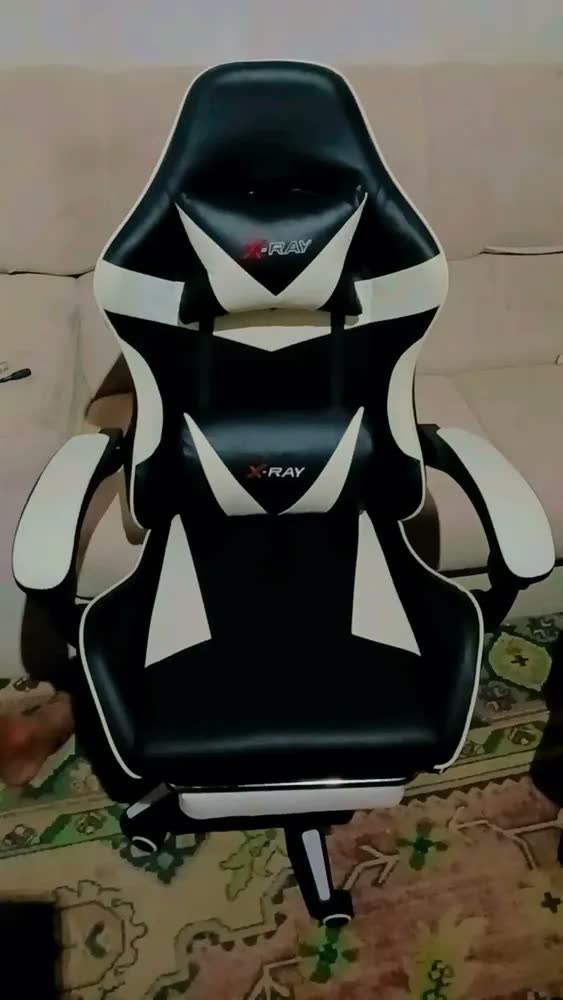 foto de Cadeira Gamer Elidy X-Ray Ergonômica Reclinável com Apoio Pés Couro Sintético Preto