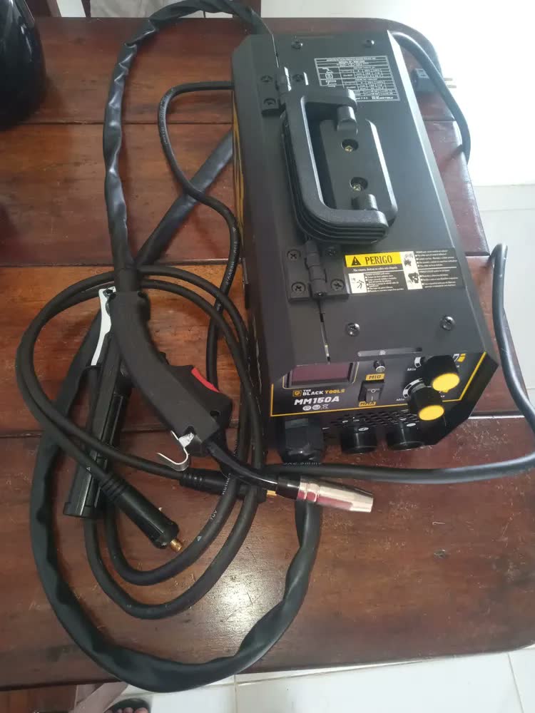 foto de Máquina Solda Inversora Mig Mma 150a Sem Gás Portátil Bivolt 127/220v Com Display Digital Mm150 The Black Tools