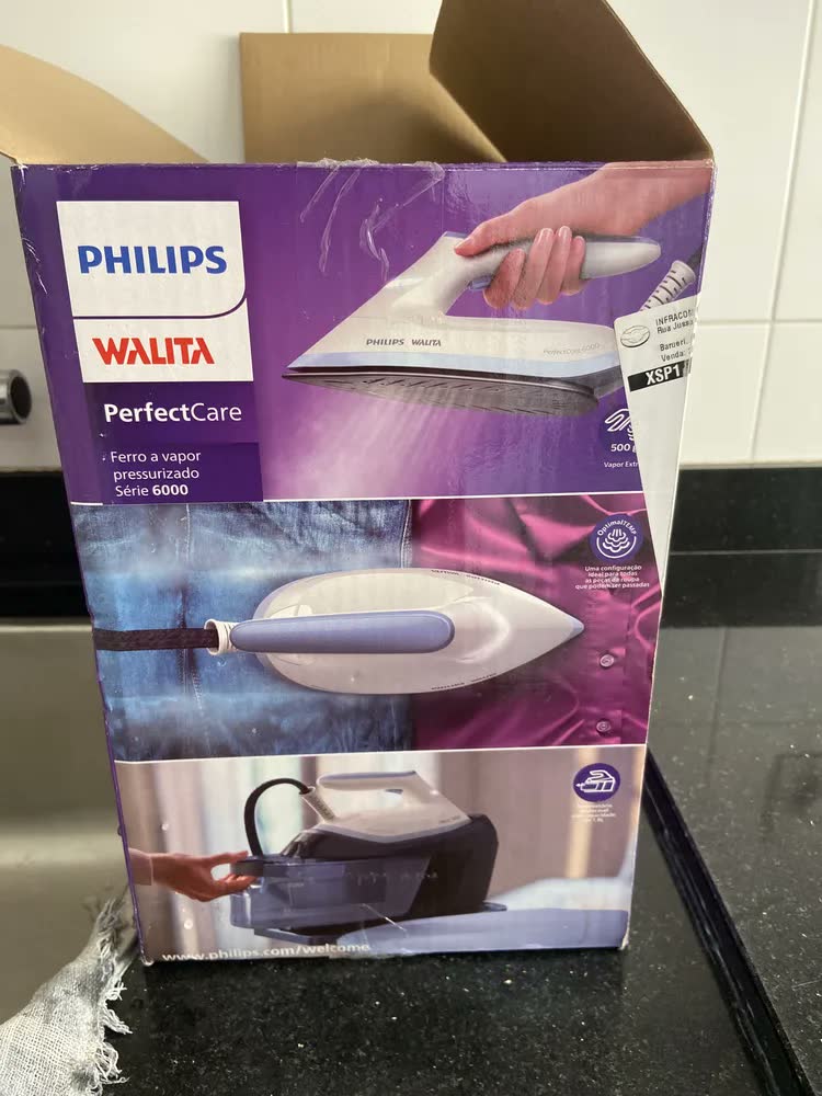 foto de Ferro de passar a vapor Philips Walita Série 6000 Perfect Care cor preto com base antiaderente PSG6064