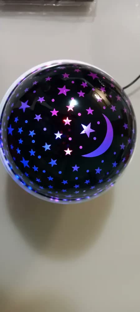 foto de Luminária Projetora LED Estrelas e Lua para Quarto Infantil Rosa