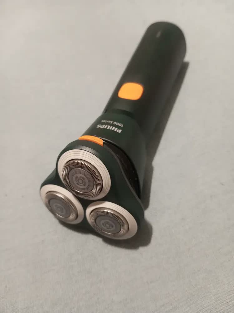 foto de Barbeador elétrico Philips Shaver série 1000 para uso seco e úmido, lâminas Powercut, cabeças flutuantes 3D, modo de operação de 35 minutos S1882/00