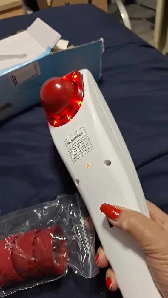 foto de Massageador Manual Infravermelho Vibratório Percussão 127v