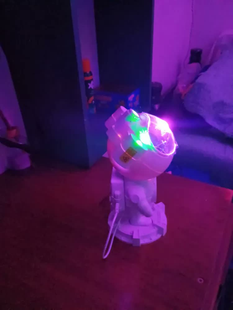 foto de Luminária Projetor Noturno Robô Astronauta Bluetooth Som Branco Preto