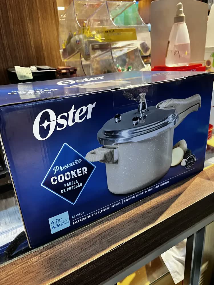 foto de Panela de Pressão Oster Bravada 4.5 Litros Antiaderente Cerâmica para Indução Cream