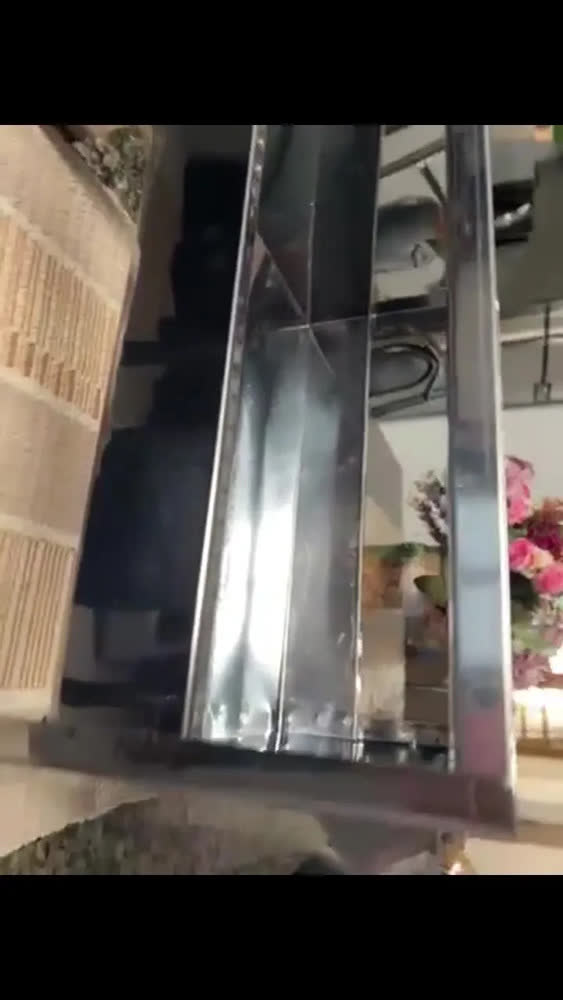 foto de Churrasqueira Portátil Camping Aço Inox Carvão Cor Prata