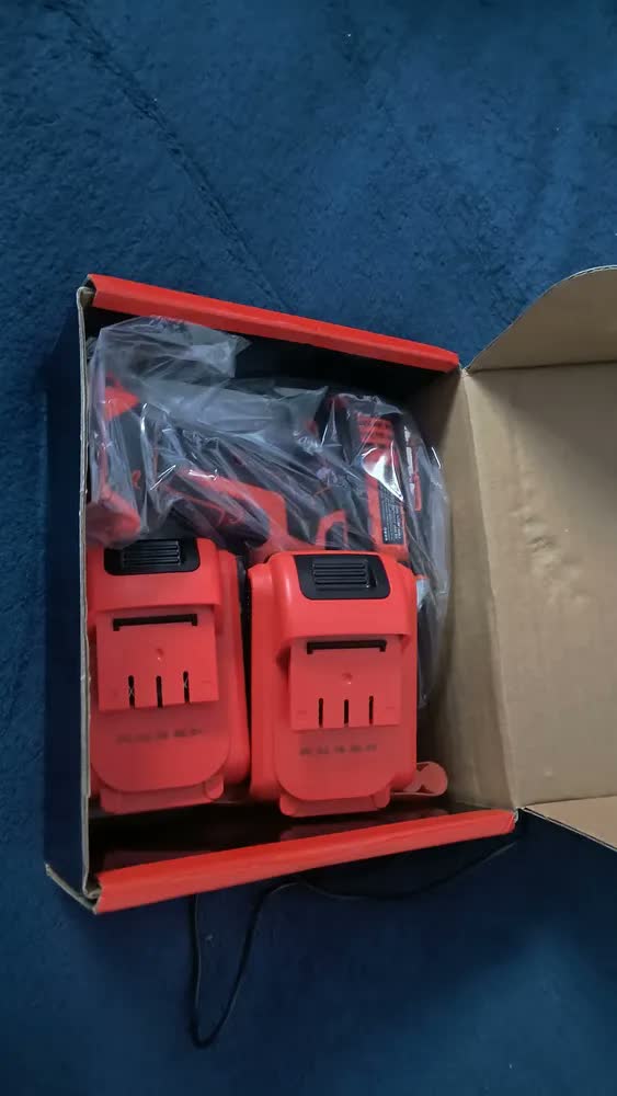 foto de Parafusadeira e Furadeira de Impacto GM Bear Sem Fio 21V, Com 2 Baterias e Kit de 28 Acessórios
