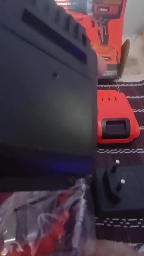 foto de Parafusadeira e Furadeira de Impacto GM Bear Sem Fio 21V, Com 2 Baterias e Kit de 28 Acessórios