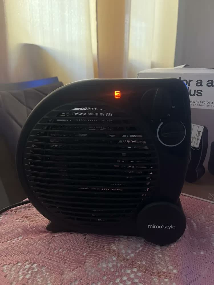 foto de Aquecedor Elétrico 110v Portátil A Ar Ventilador Quente Preto Aq04 - Mimo Style