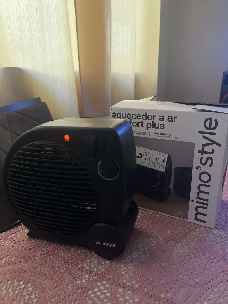 foto de Aquecedor Elétrico 110v Portátil A Ar Ventilador Quente Preto Aq04 - Mimo Style