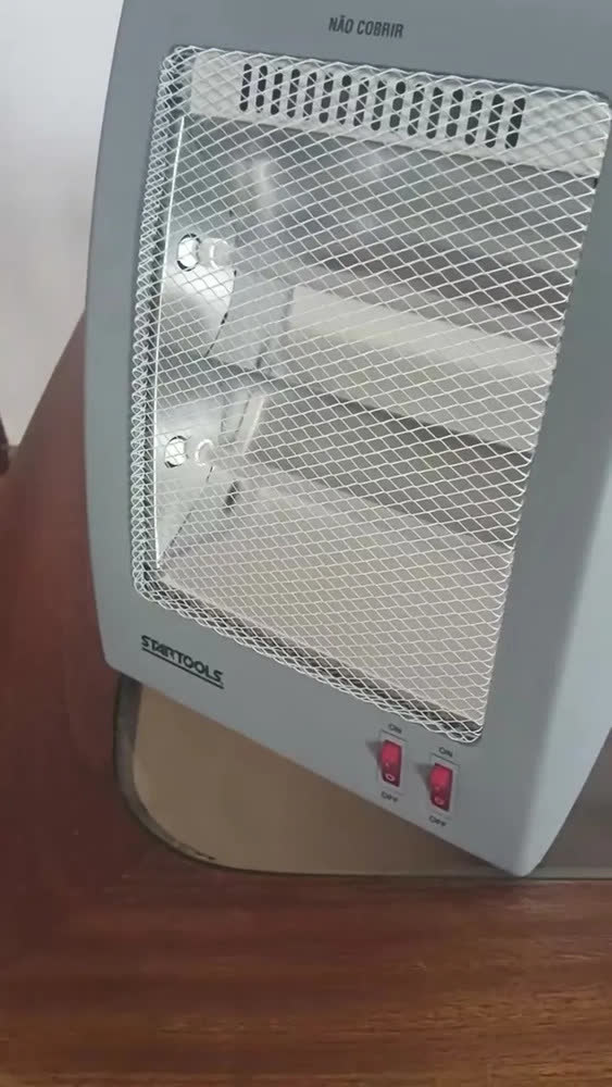 foto de Aquecedor Elétrico Compacto Domestico Quarto Sala Escritório Quartzo Com 2 Potências 400w 800w Portátil Shokki