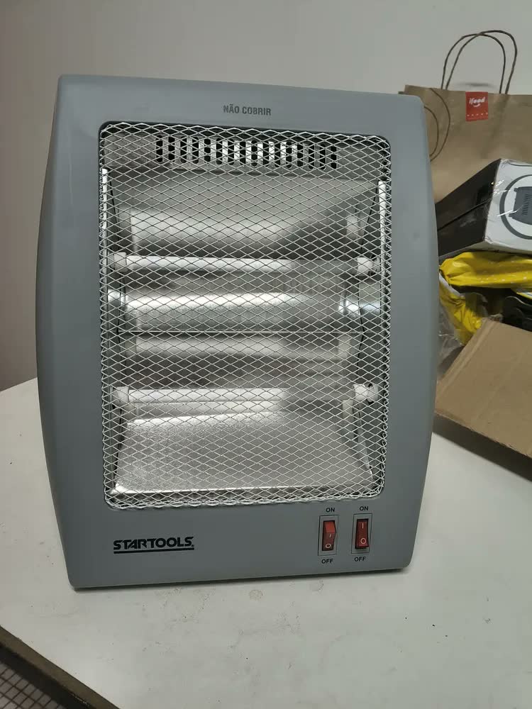 foto de Aquecedor Elétrico Compacto Domestico Quarto Sala Escritório Quartzo Com 2 Potências 400w 800w Portátil Shokki