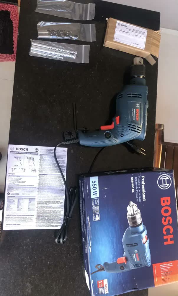 foto de Chave de fenda elétrica Bosch GSB 550 RE 550W 13 mm, furadeira de impacto + acessório com caixa de papelão