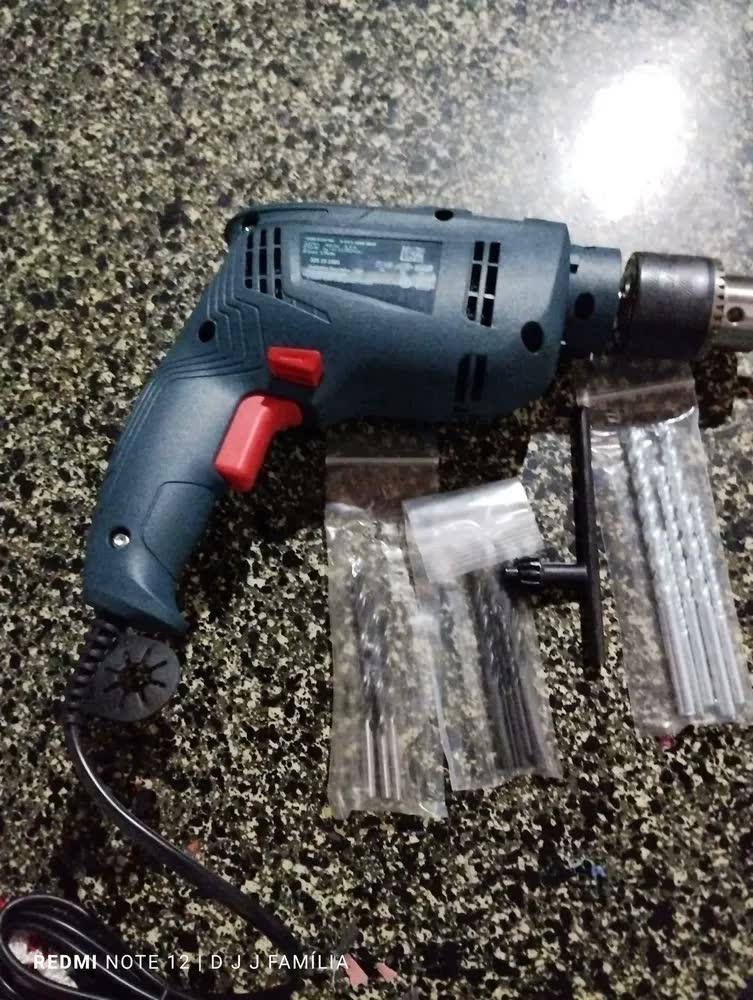 foto de Chave de fenda elétrica Bosch GSB 550 RE 550W 13 mm, furadeira de impacto + acessório com caixa de papelão